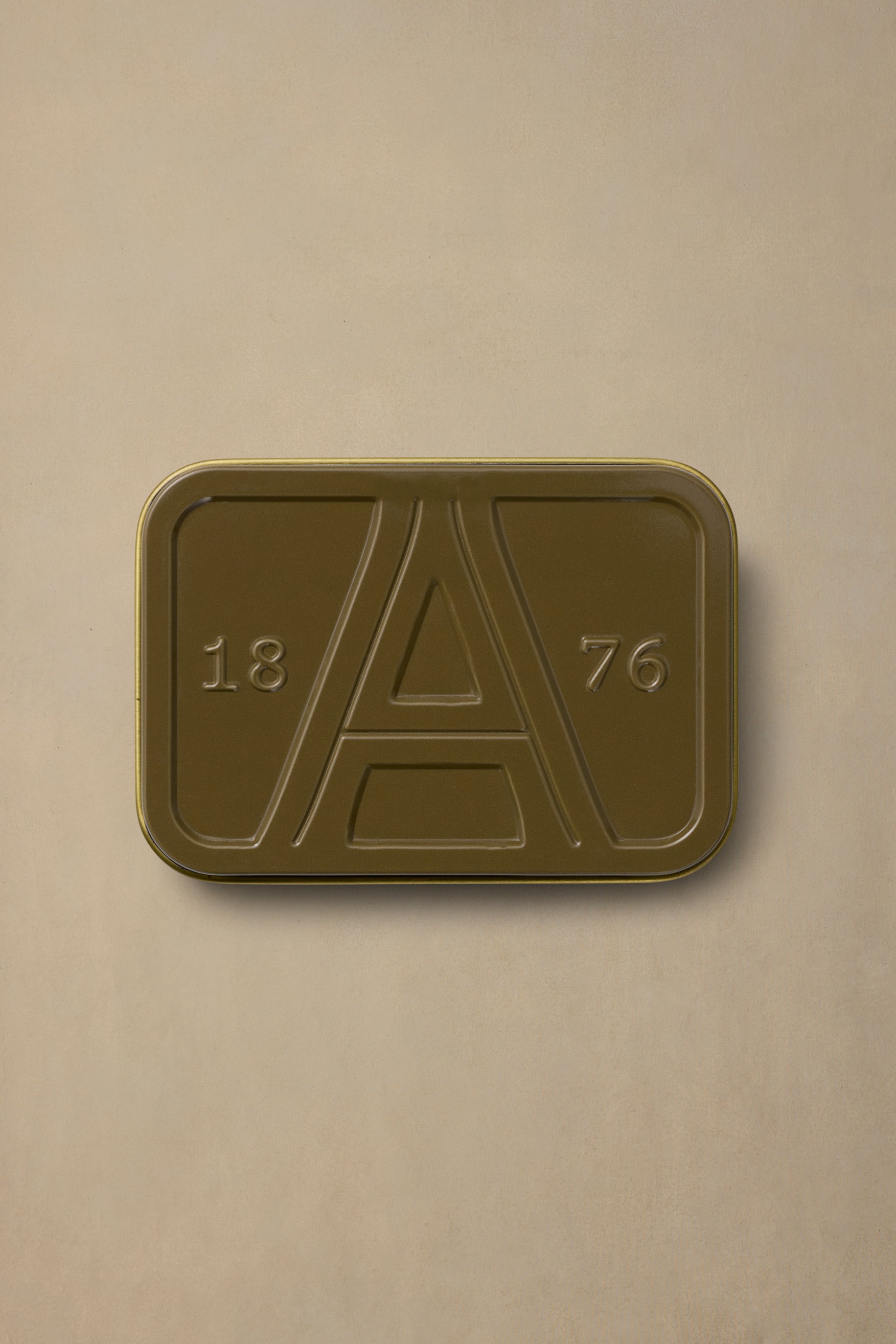 Gold rectangular NSW State pin badge with embossed 'A' design and 1876 dates on neutral background