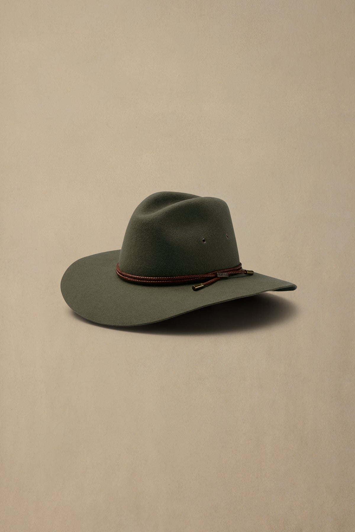 Fern green rabbit fur felt cowboy hat with burgundy beaded band, displayed on neutral background